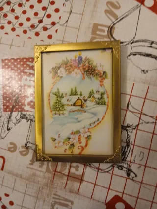 Cornice dorata in metallo