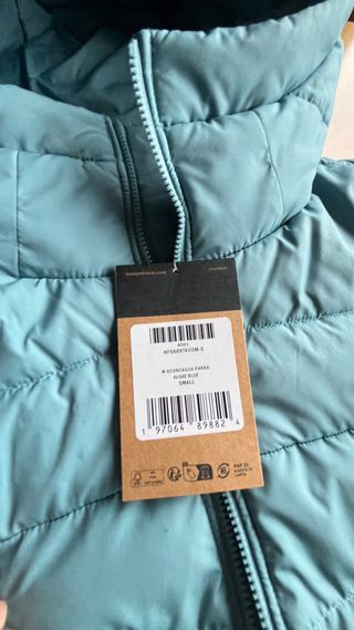 Plumífero The North Face con etiqueta