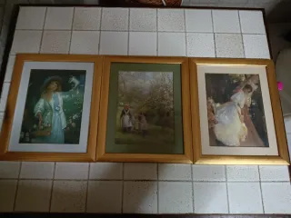 Quadro con cornice dorata e foto