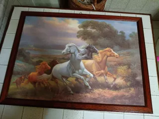 Quadro con cornice dorata e foto