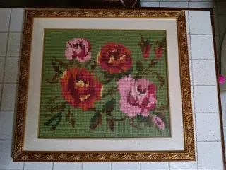 Quadro con cornice dorata e foto