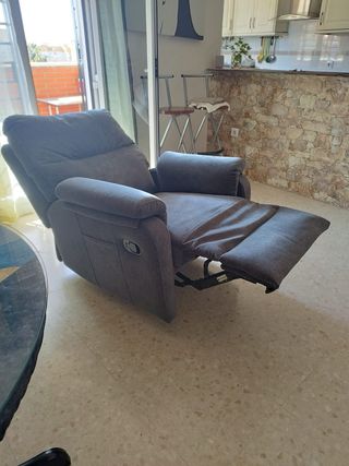 Sillón reclinable de tela gris