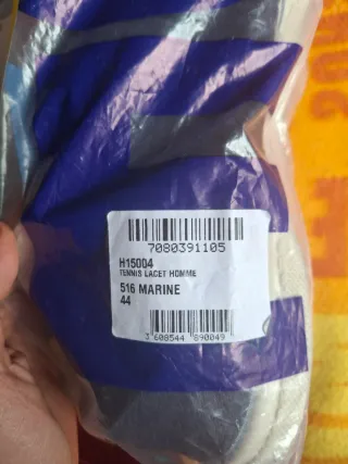 Zapatos de lona azul y blanco