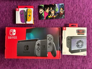 Nintendo Switch Viola/Giallo + Accessori
