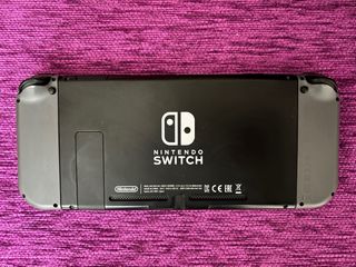 Nintendo Switch Viola/Giallo + Accessori