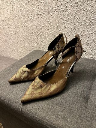 Tacchi vintage eleganti con stampa iconica