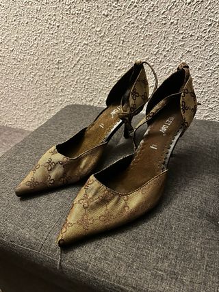 Tacchi vintage eleganti con stampa iconica