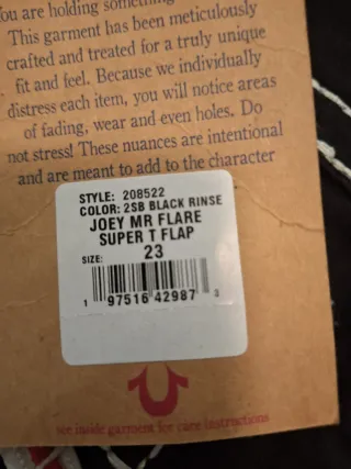 Vaqueros True Religion Negros con Costuras Blancas