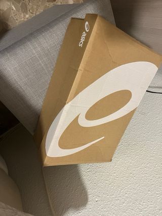 Zapatillas Asics Gel Cumulus Blancas y Plateadas