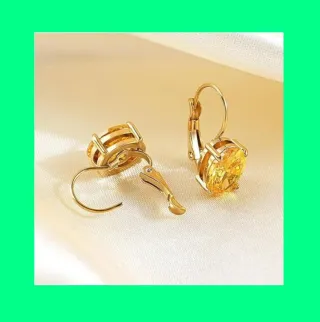 Pendientes ovalados dorados con piedra amarilla