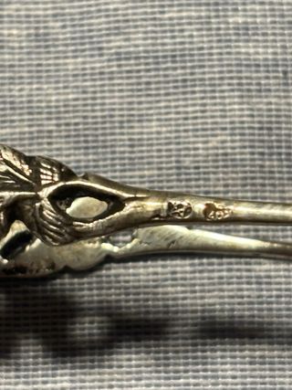 Vecchie pinze per zucchero in argento con fiore