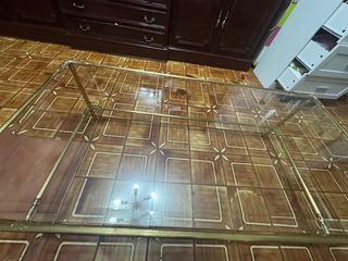 Mesa de centro cristal y metal dorado