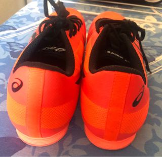 Zapatillas atletismo Asics clavos naranja