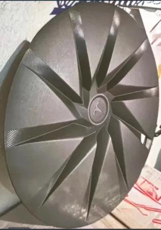 Tapacubos Tesla Prismata 2026