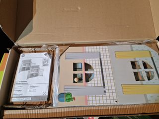 Casa de muñecas de madera