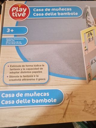 Casa de muñecas de madera