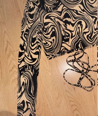 Top estampado animal print manga larga