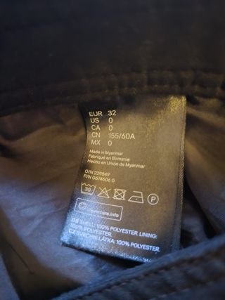 Falda mini H&M botones negra Talla 32