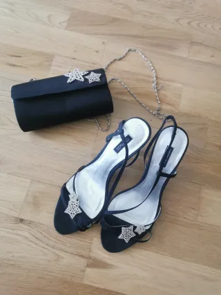 Sandalias negras con estrellas brillantes y bolso