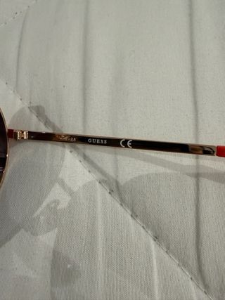 Gafas de sol mujer Guess doradas
