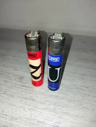 2 accendini Clipper lettere