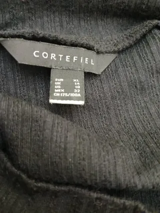 Camiseta negra manga larga con volantes