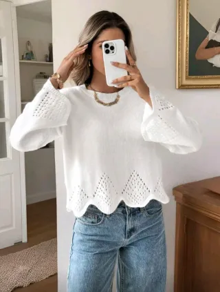 Suéter blanco elegante con detalles