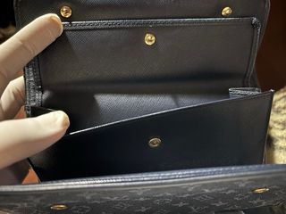 Cartera LV Porte Trésor International Mini Lin
