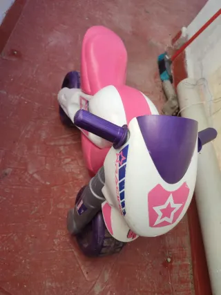 Triciclo infantil azul y amarillo