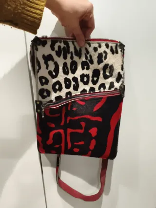 Bolso artesanal estampado de cuero