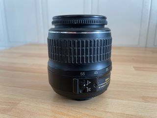 Nikon D3100 + Nikkor 18-55mm + Accessori