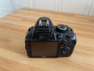 Nikon D3100 + Nikkor 18-55mm + Accessori