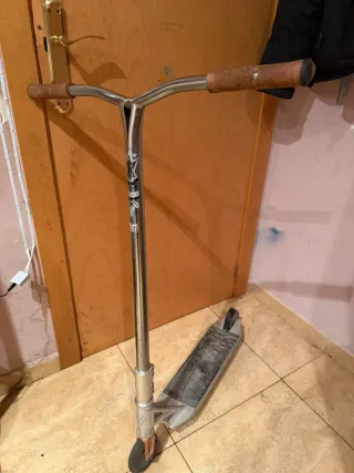 Patinete freestyle plateado