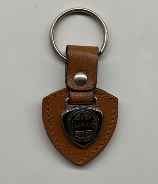 Portachiavi Lancia in metallo e pelle, vintage