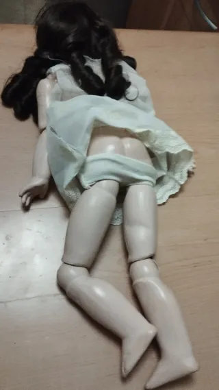 Due bambole di porcellana antiche