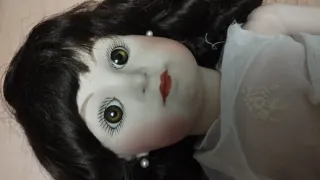 Due bambole di porcellana antiche