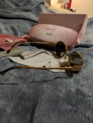 Occhiali Miu Miu Donna Oro Marrone