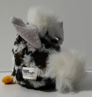 Furby 1998 Snow Leopard, Español