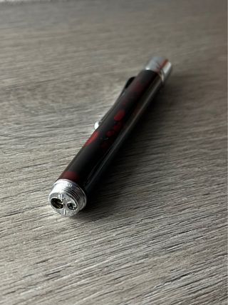 Penna sfera con accendino torcia