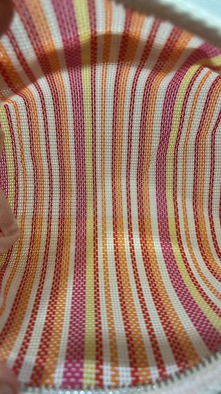 Neceser Isabel Marant rayas naranja y rosa