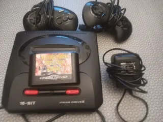 Sega Mega Drive II con 2 controller e gioco
