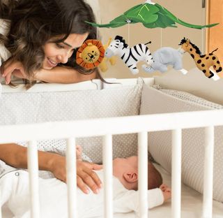 Móvil cuna con música y rotación – NUEVO