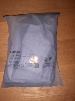 Blusa negra con cinturón