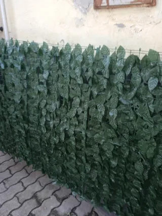 Pannello decorativo con foglie verdi