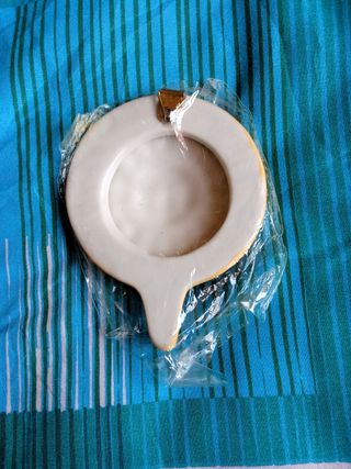 Appendino in ceramica dipinta sole