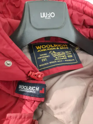 Piumino Woolrich rosso unisex