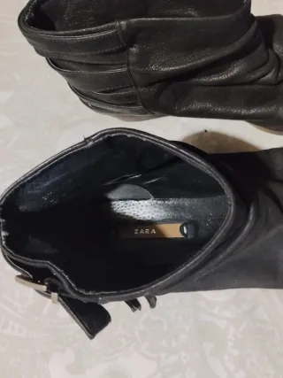 Botines piel negros con varias hebillas decorativa