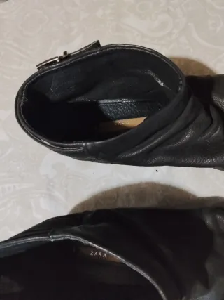 Botines piel negros con varias hebillas decorativa