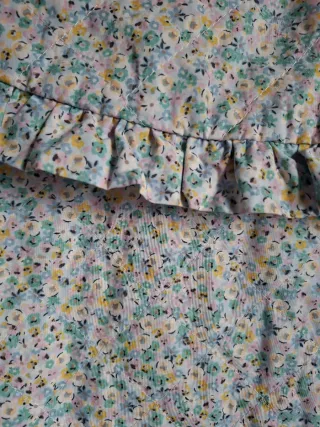 Chaqueta acolchada flores cuello volante