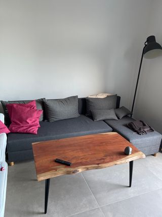 Sofá modular gris. Se hace cama y almacenamiento